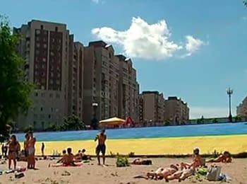 Obolons'ka embankment in Kyiv painted in the colors of the Ukrainian flag, on June 9, 2014