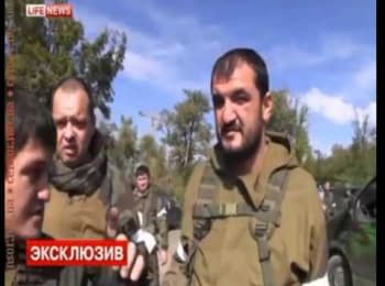 Abkhazians and Ossetians ride on machines with Ukrainian numbers and dance lezginka in Donetsk