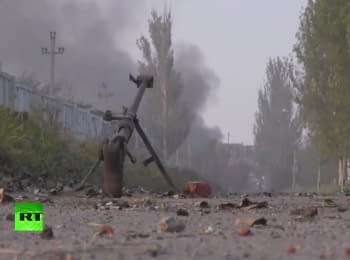 RT reportage. How the militants firing from the residential areas at Donetsk airport