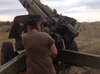 Terrorists fire with the newly supplied howitzers 2A65 "MSTA-B" near Debaltsevo