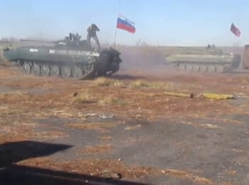 BMD under the Russian flag is shelling the positions of the Armed Forces of Ukraine