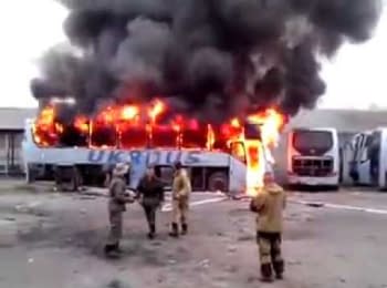 DPR terrorists taking pictures against the backdrop of a burning ukrainian bus (18+, obscene language)