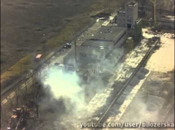 Suppression by fire positions of terrorists in the area of the Donetsk airport. Footage with the drone, March 2015