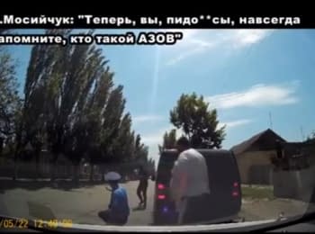 Mosiychuk puts on his knees policeman's in Berdyansk